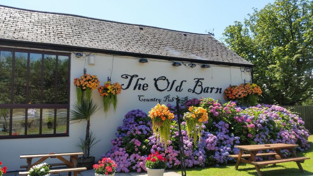 Pretty garden view of the Old Barn Inn in Newport